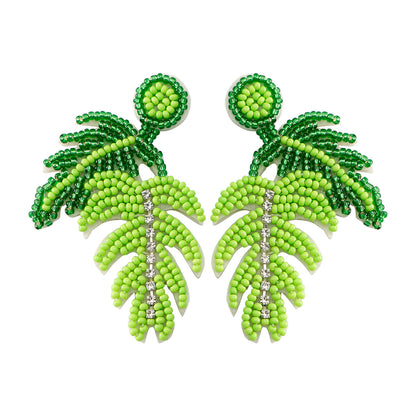 handmade leaf perler beaded earrings, mini perler bead earrings, cute perler bead earrings, beaded dangle earrings, patterns beaded earrings, handmade beaded earrings, boho beaded earrings, green beaded earrings