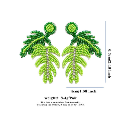 handmade leaf perler beaded earrings, mini perler bead earrings, cute perler bead earrings, beaded dangle earrings, patterns beaded earrings, handmade beaded earrings, boho beaded earrings, green beaded earrings